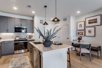 Gourmet prep islands with pendant lighting*